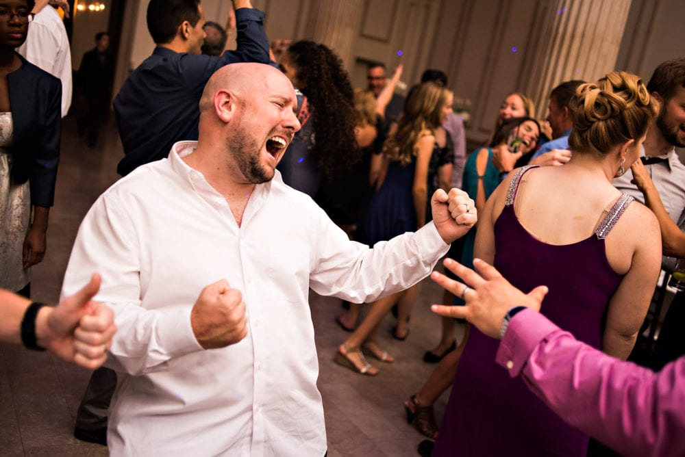 Guest dances during wedding reception