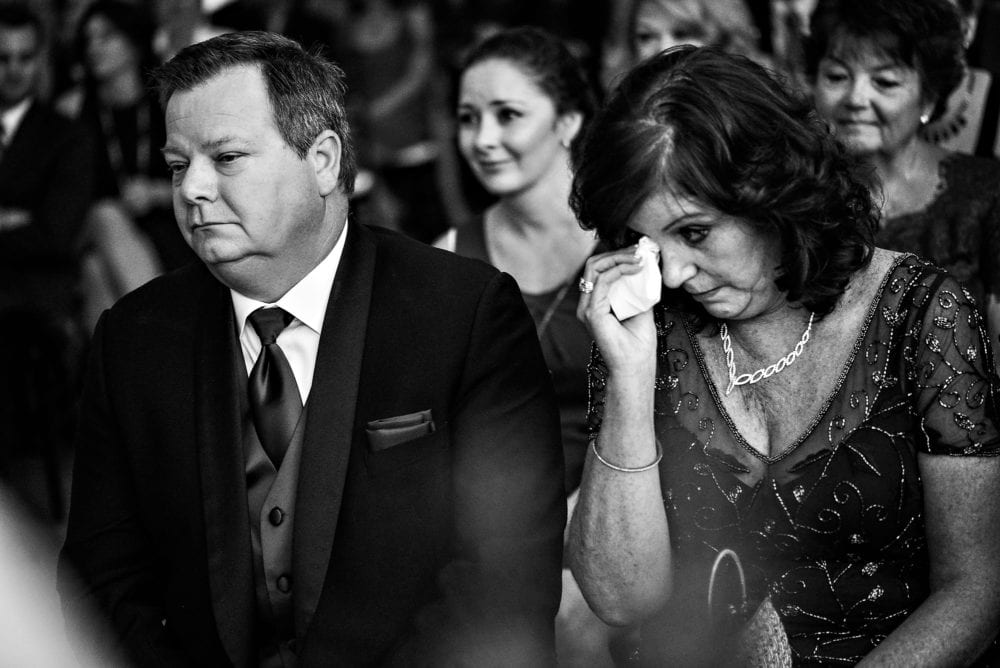 Parents cry during wedding ceremony