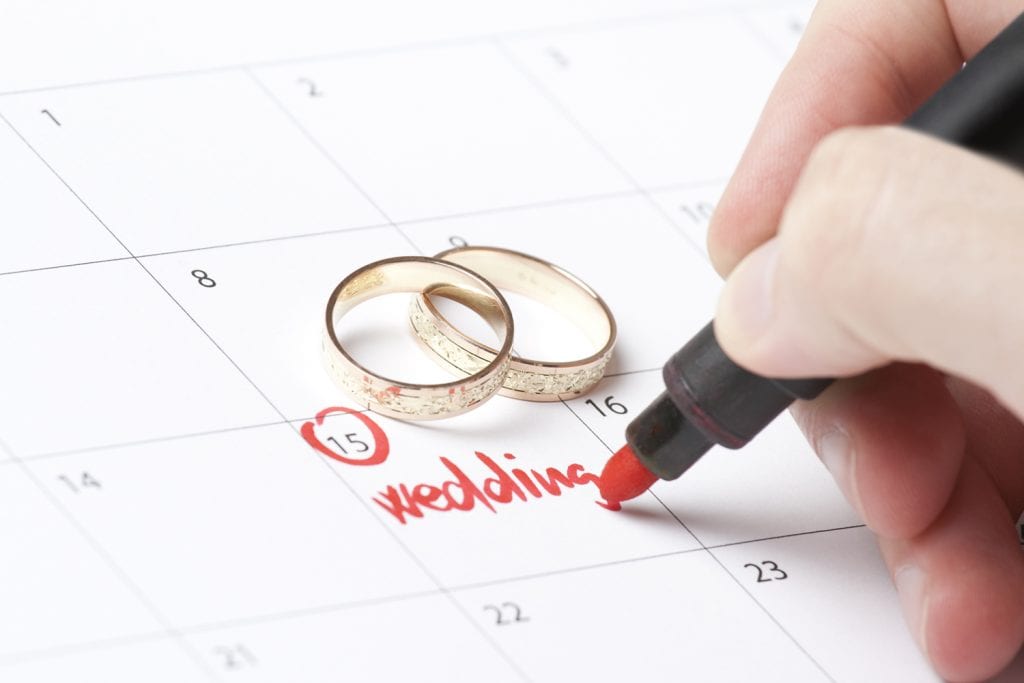 Calendar with wedding date and rings
