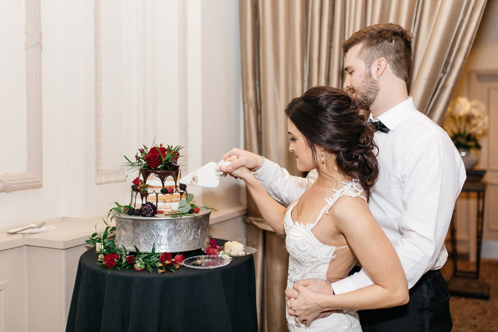 Cake Cutting | Kirsten + JC | Treasury on the Plaza Wedding Full of Surprises for Guests | St. Augustine Wedding Venue