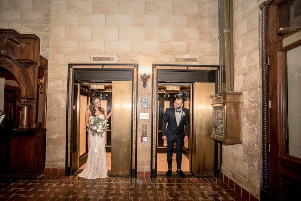 First look in Treasury on the Plaza elevators | An Intimate Wedding in St. Augustine | Mackenzie + Nick