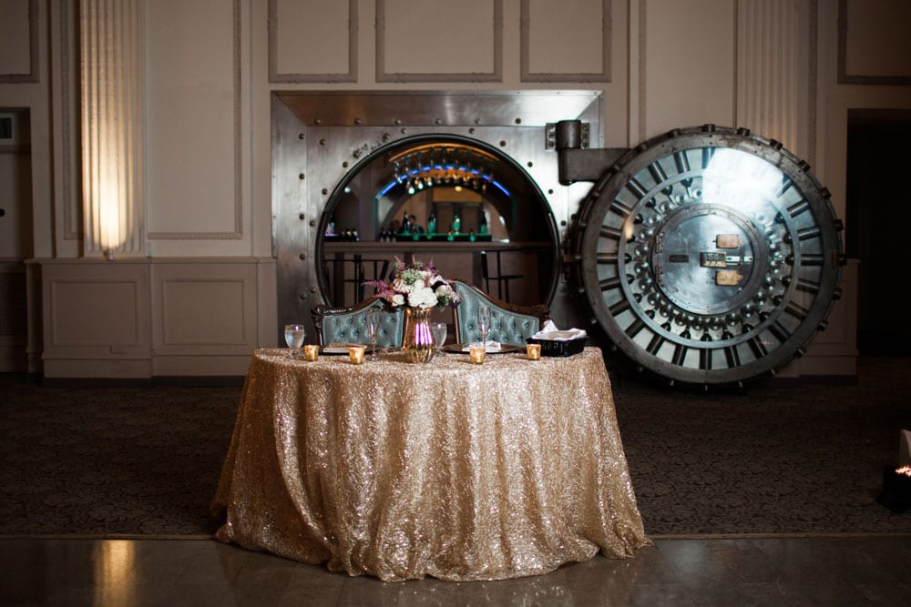 Sweetheart table in front of The Vault at The Treasury