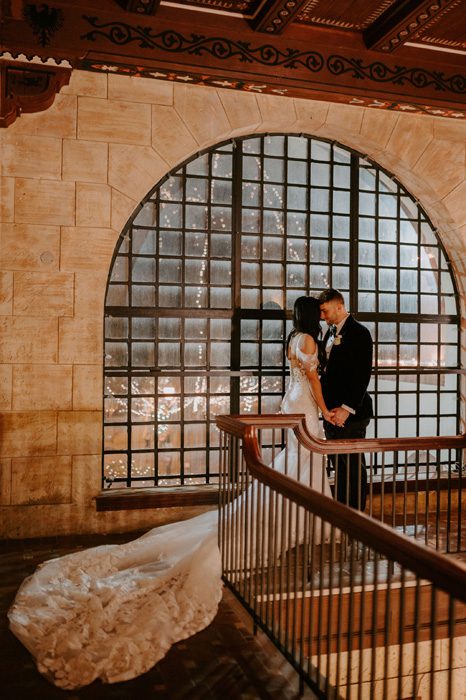Treasury on the Plaza balcony |Glam Wedding with a Rock and Roll Surprise at The Treasury | Cristal + Steven