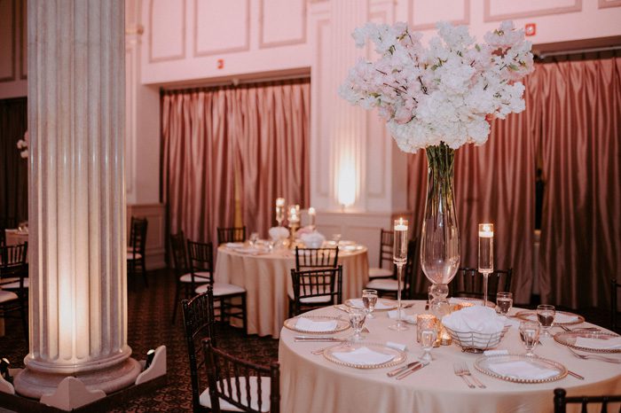 pink wedding reception decor | Glam Wedding with a Rock and Roll Surprise at The Treasury | Cristal + Steven
