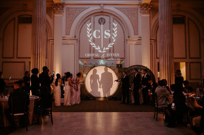 Wedding reception entrance from the vault| Glam Wedding with a Rock and Roll Surprise at The Treasury | Cristal + Steven