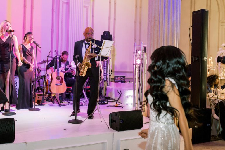 Jenni's Uncle plays the saxophone at her Treasury On The Plaza wedding