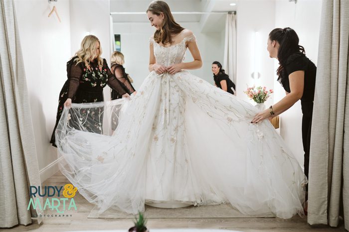 wedding dress shopping trying on an Ines di Santo gown at The Bridal Finery