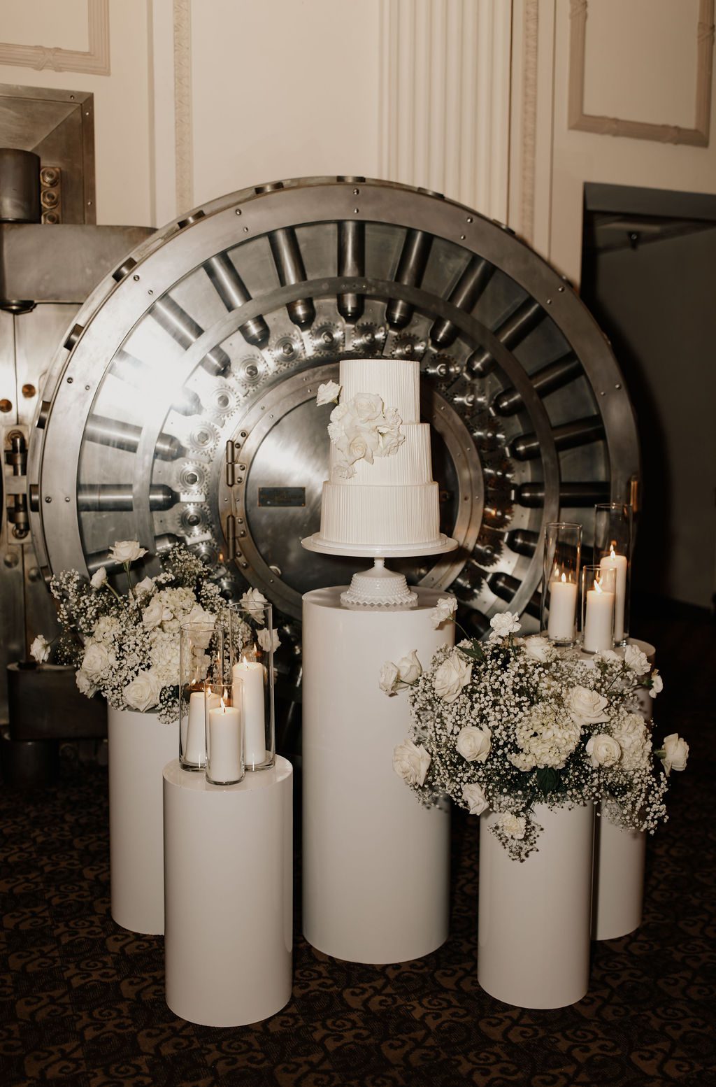 Addison and Anthony's cake in front of the Vault door