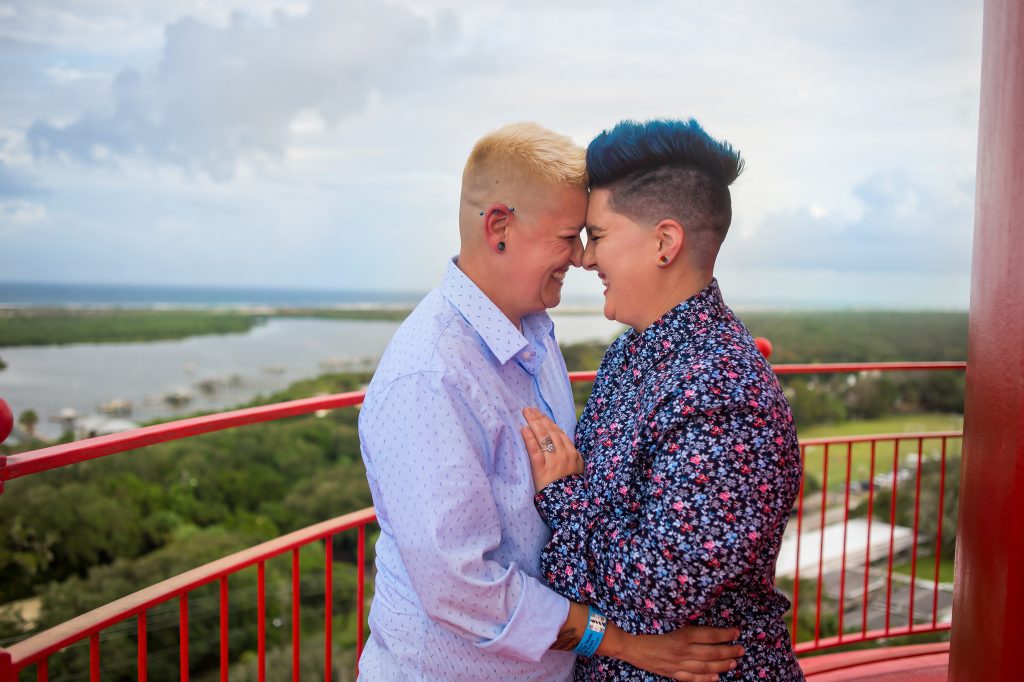 two women taking engagement photo from top of St. Augustine Lighthouse