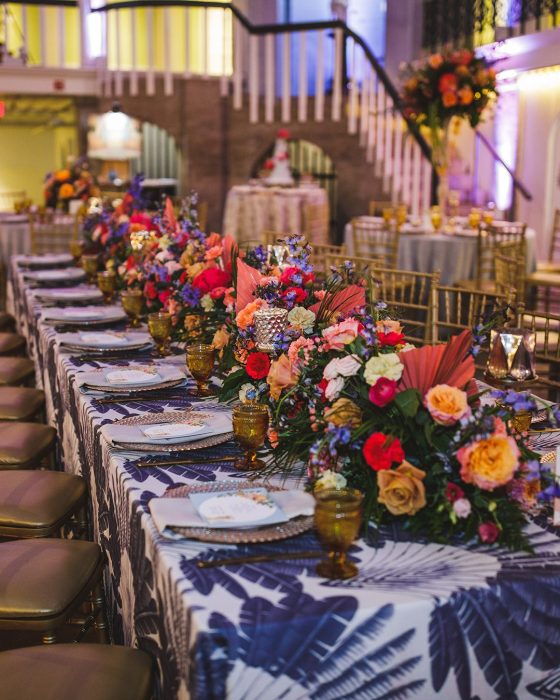 Bright floral arrangements used as wedding centerpieces
