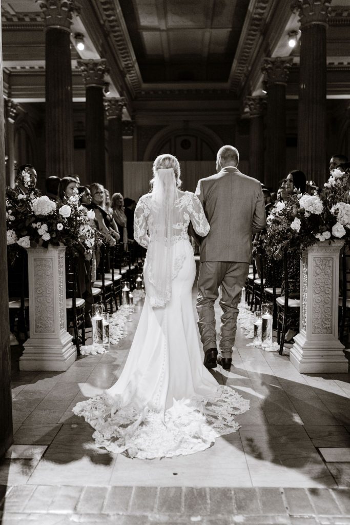 Jess walking down the aisle with her father