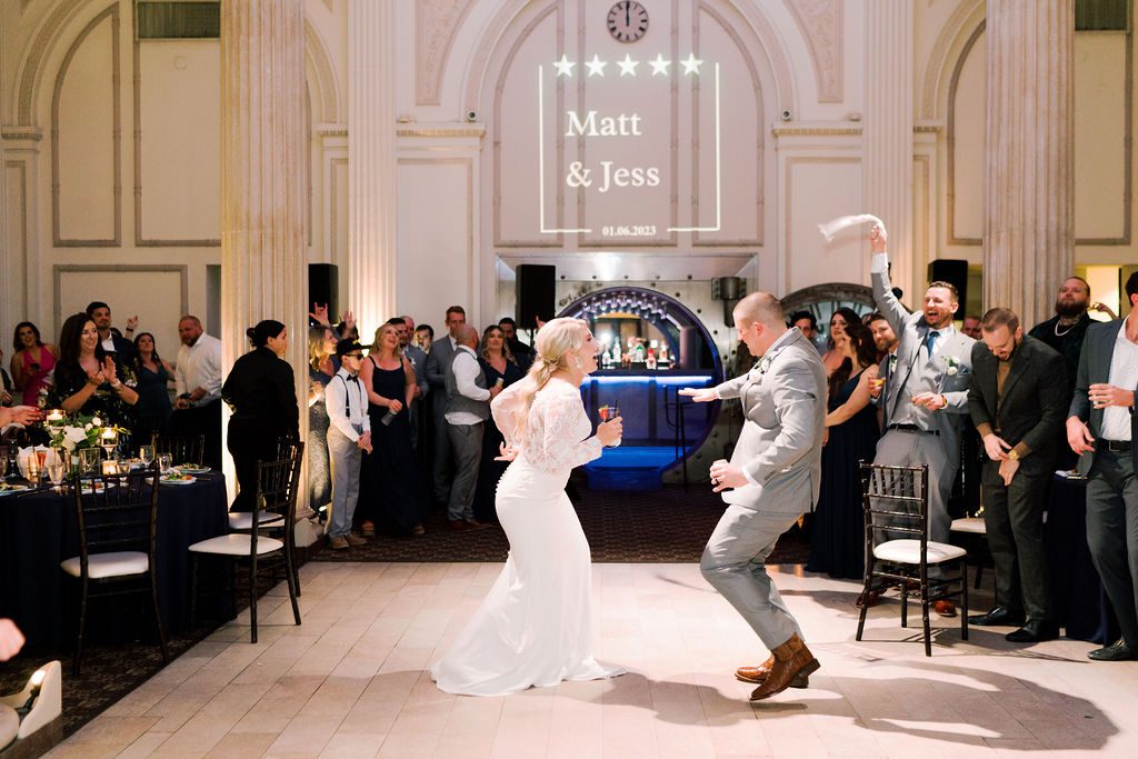 Jess and Matt dancing energetically