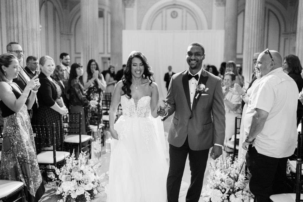 black and white photo of Sarah and Kevin after their wedding ceremony