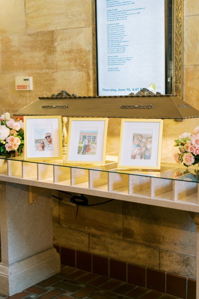 Photographs of the bride and groom in gold frames
