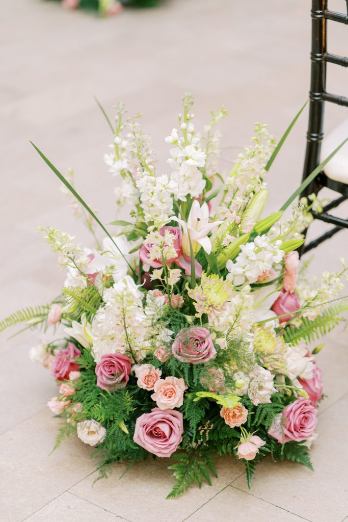 floral arrangement decorating the aisle