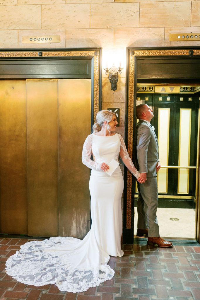 Jess and Matt's "first touch" in vintage elevator