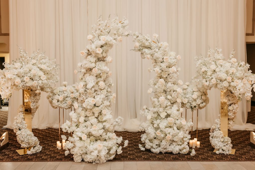 white floral wedding arch