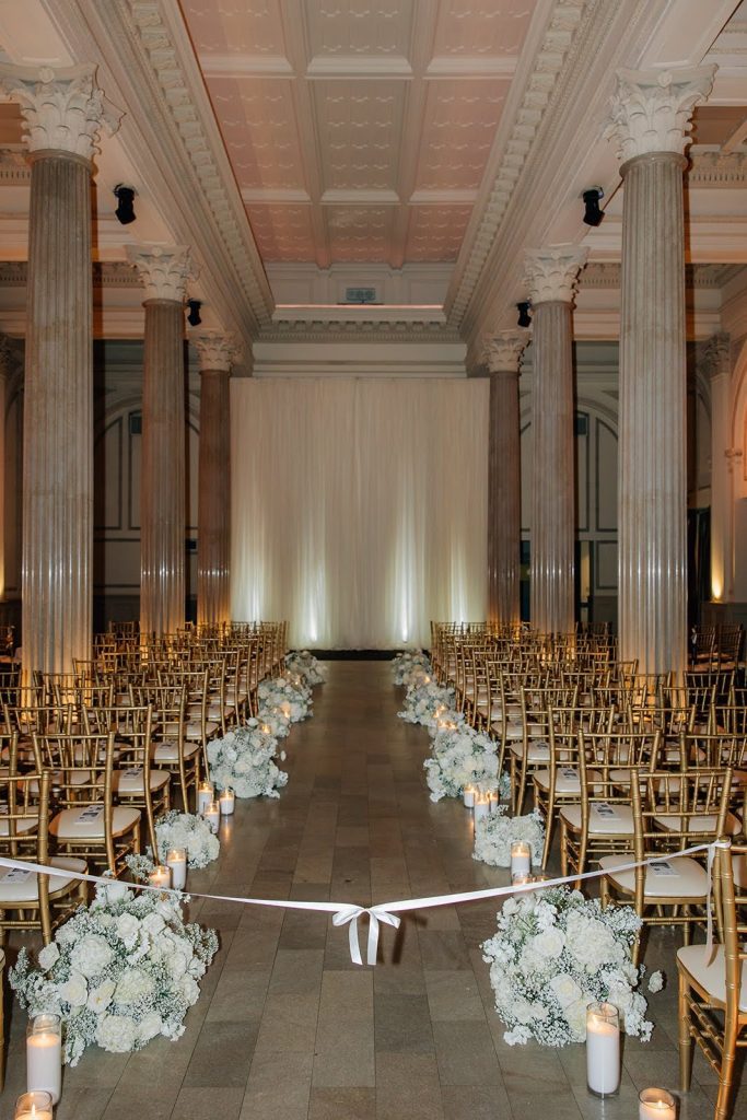 floral wedding aisle decor at Treasury on the Plaza