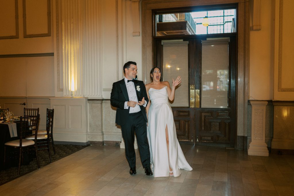 Bride and groom excited by first look at reception venue