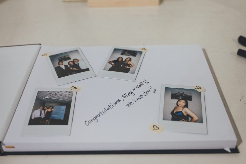 wedding guestbook with polaroid photos