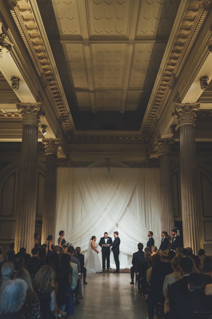 View of wedding ceremony from the back of the Grand Ballroom