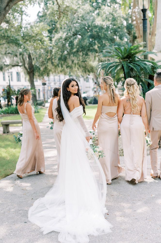 Bride and bridesmaids take photos in St. Augustine