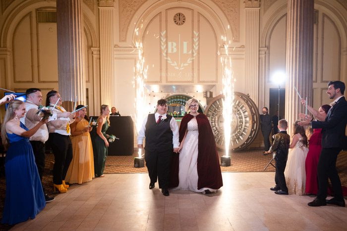 For their Harry Potter wedding at The Treasury on The Plaza, Brandi and Lexy asked guests to wear house colors