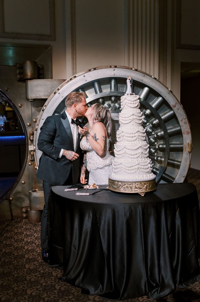 Bride and Groom Cutting Cake