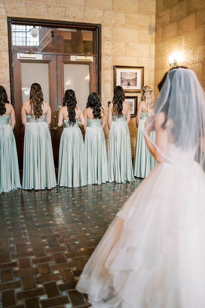 Bride first look with Bridesmaids