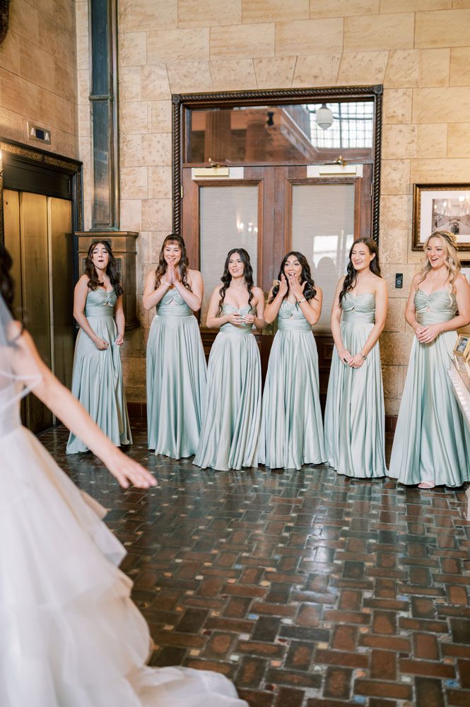Bride first look with bridesmaids