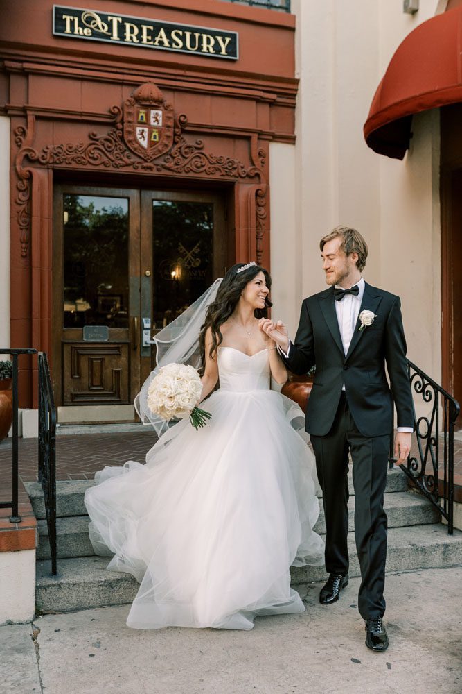 Bride and Groom in front of Building