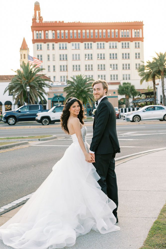 Bride and Groom in front of Building