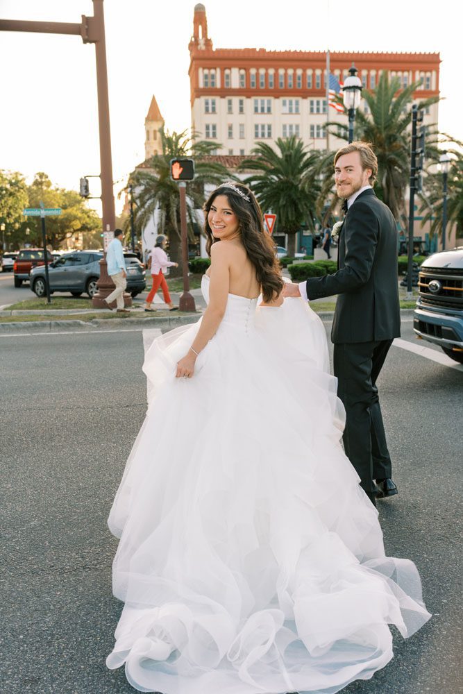 Bride and Groom in front of Building