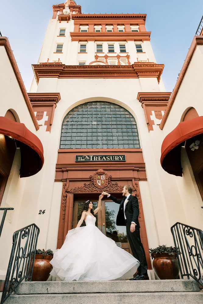 Bride and Groom In front of Building