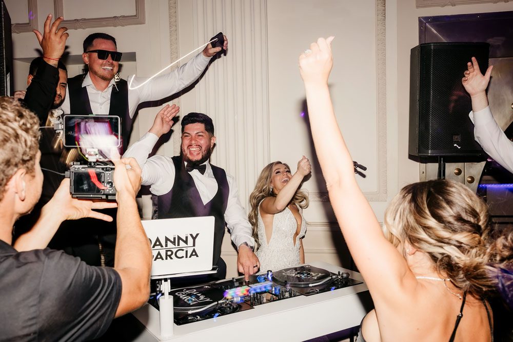 Couple DJing at Reception