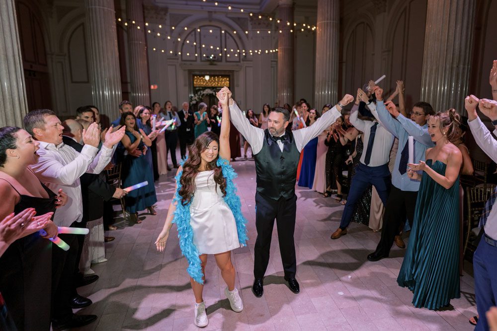 Couple dancing with guests
