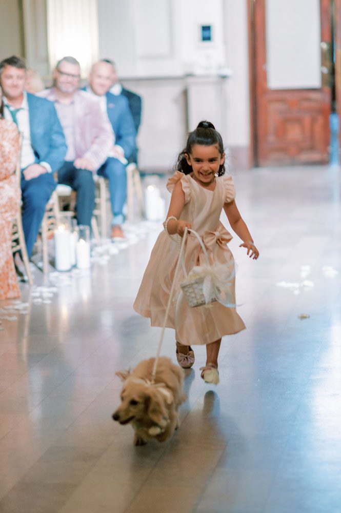 Flower girl walking with dog