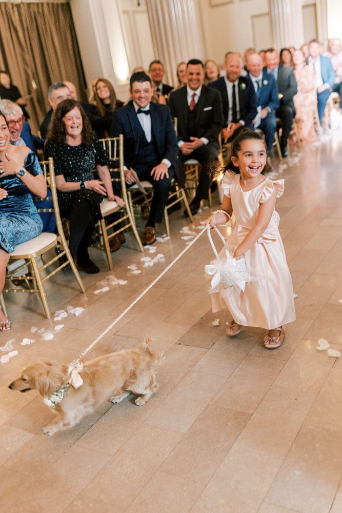 Flower girl walking with dog