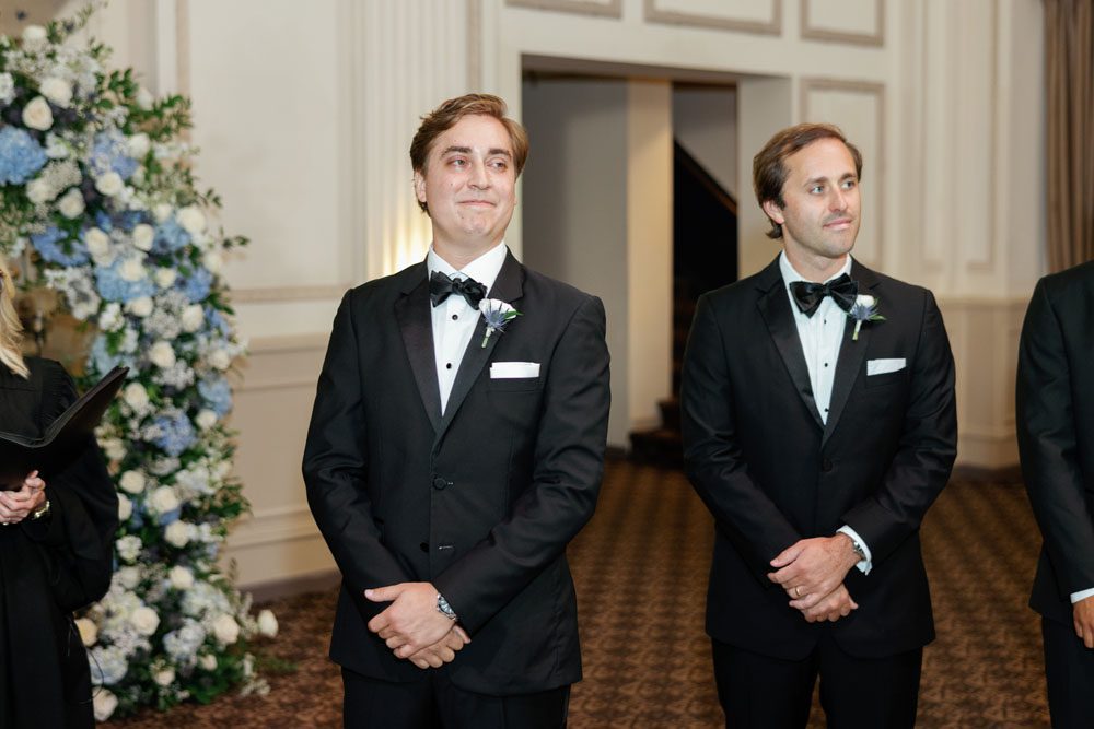 Groom at altar