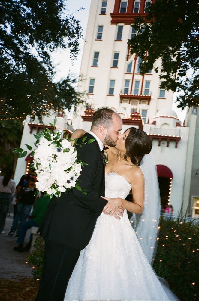 Couple in front of Treasury on the Plaza