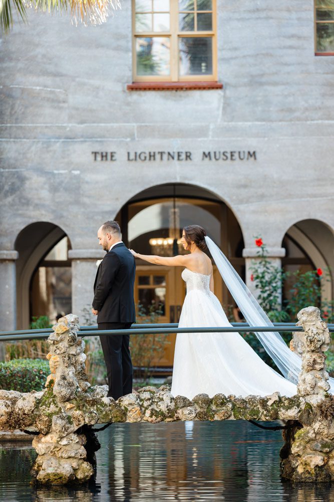 First Look between Bride and Groom in the Lightner Museum Courtyard