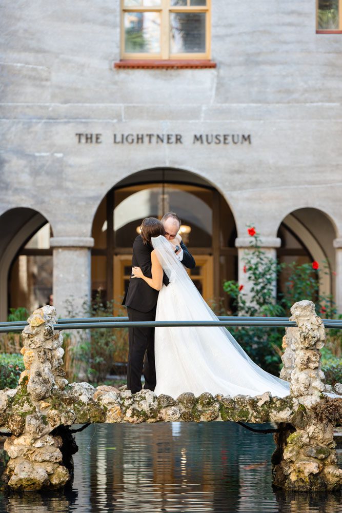First Look between Bride and Groom in the Lightner Museum Courtyard