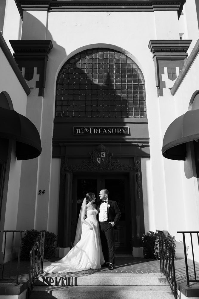 Bride and Groom Portraits in front of Treasury on the Plaza