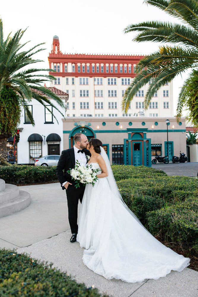 Couple in front of Treasury on the Plaza