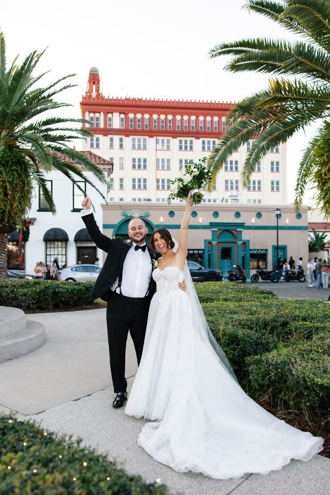 Couple in front of Treasury on the Plaza