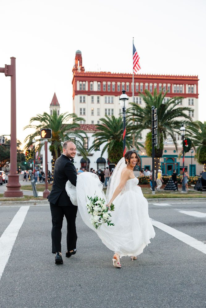 Couple in front of Treasury on the Plaza