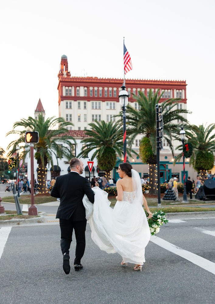 Couple in front of Treasury on the Plaza