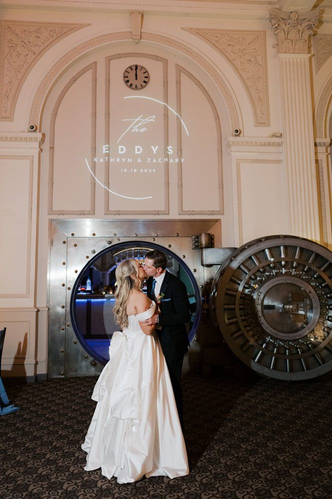 Bride and Groom Portraits in front of Vault Door