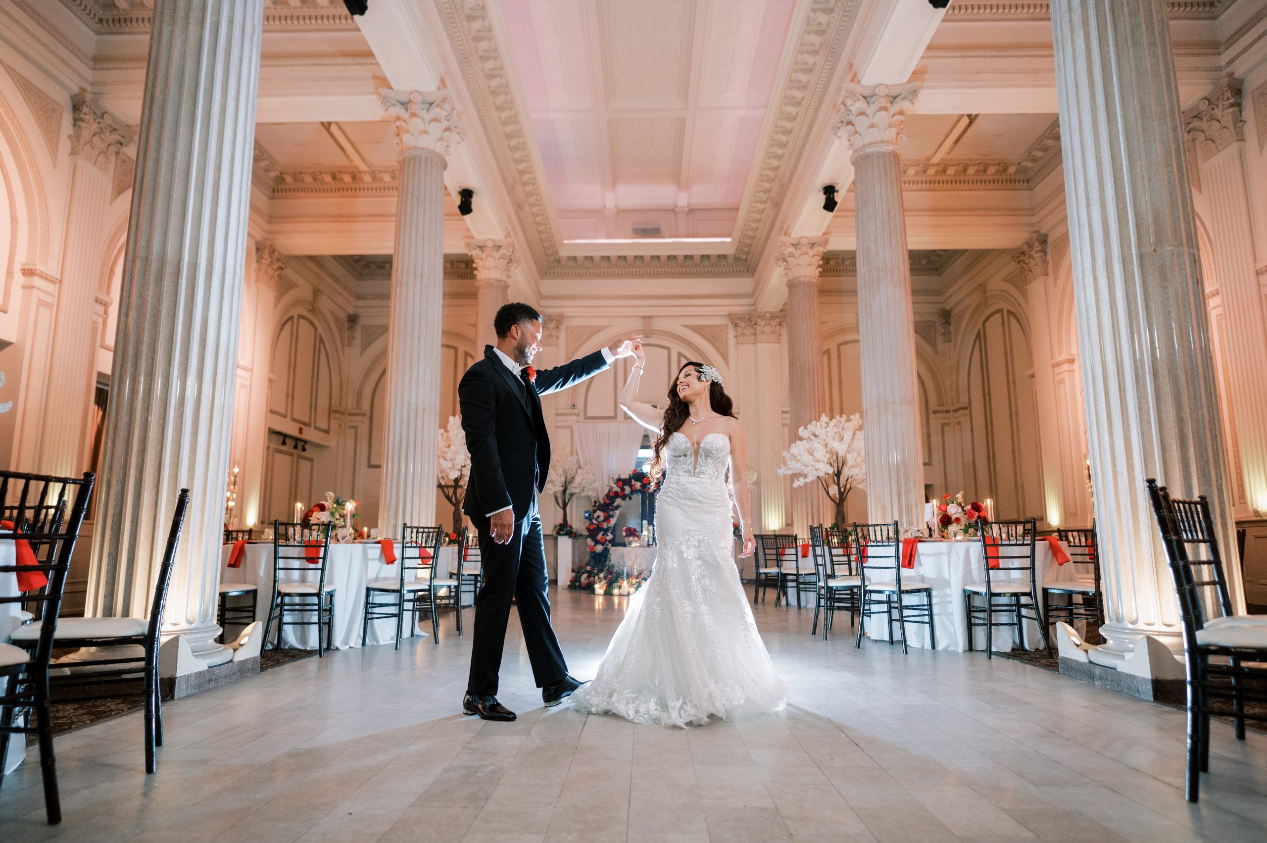 Monet and Ryan celebrating in The Treasury's Grand Ballroom | Photo: Angelita Esparar